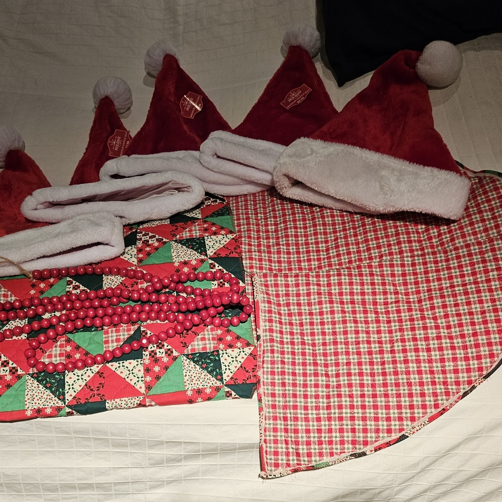 Festive Red Santa Hats and Christmas Tree Skirt